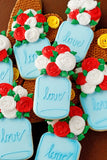 pretty cookies with red and white roses