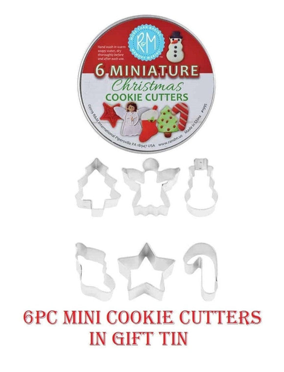 christmas cookie cutters in a gift tin